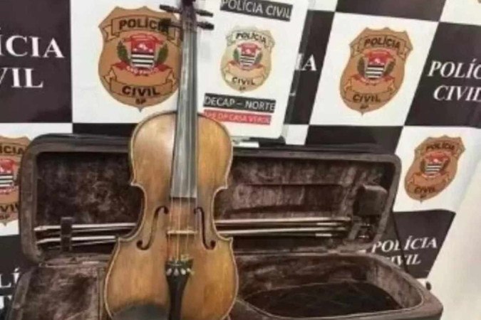 Homem é preso ao tentar vender violino de 100 anos furtado ao próprio dono -  (crédito: Reprodução/Polícia Civil)