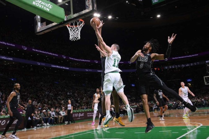 Com 28 pontos, Payton Pritchard foi o cestinha de mais uma vitória dos Celtics -  (crédito: Brian Babineau / AFP)