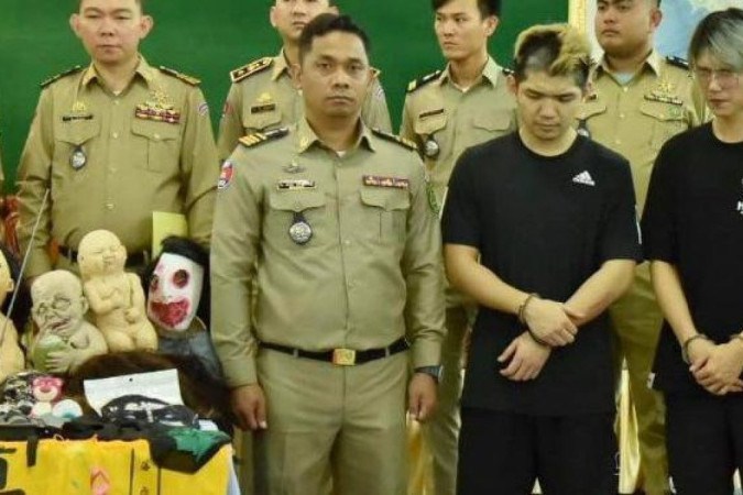 Cheng Neng-chuan e Lu Tsu-hsien foram condenados a dois anos de prisão -  (crédito: Polícia Nacional do Camboja)
