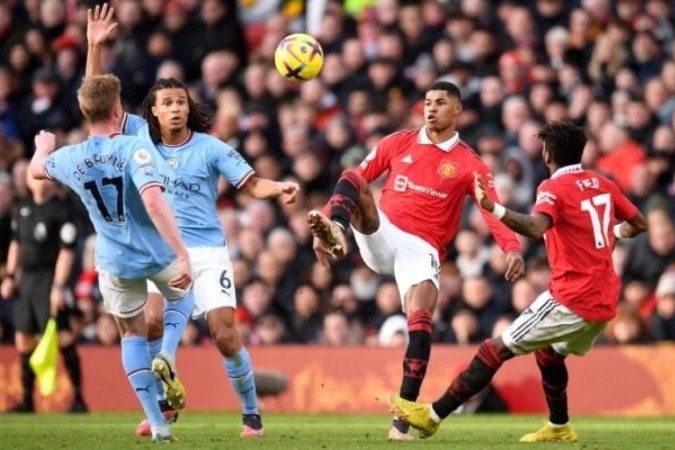 United e City fazem o clássico de Manchester na Premier League - (crédito: AFP via Getty Images) United e City fazem o clássico de Manchester na Premier League - (crédito: AFP via Getty Images)