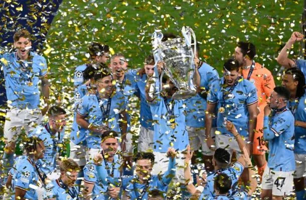 Jogadores do Manchester City celebram a conquista da Champions - Foto: Yasin Akgul/AFP via Getty Images -  (crédito: Foto: Yasin Akgul/AFP via Getty Images)