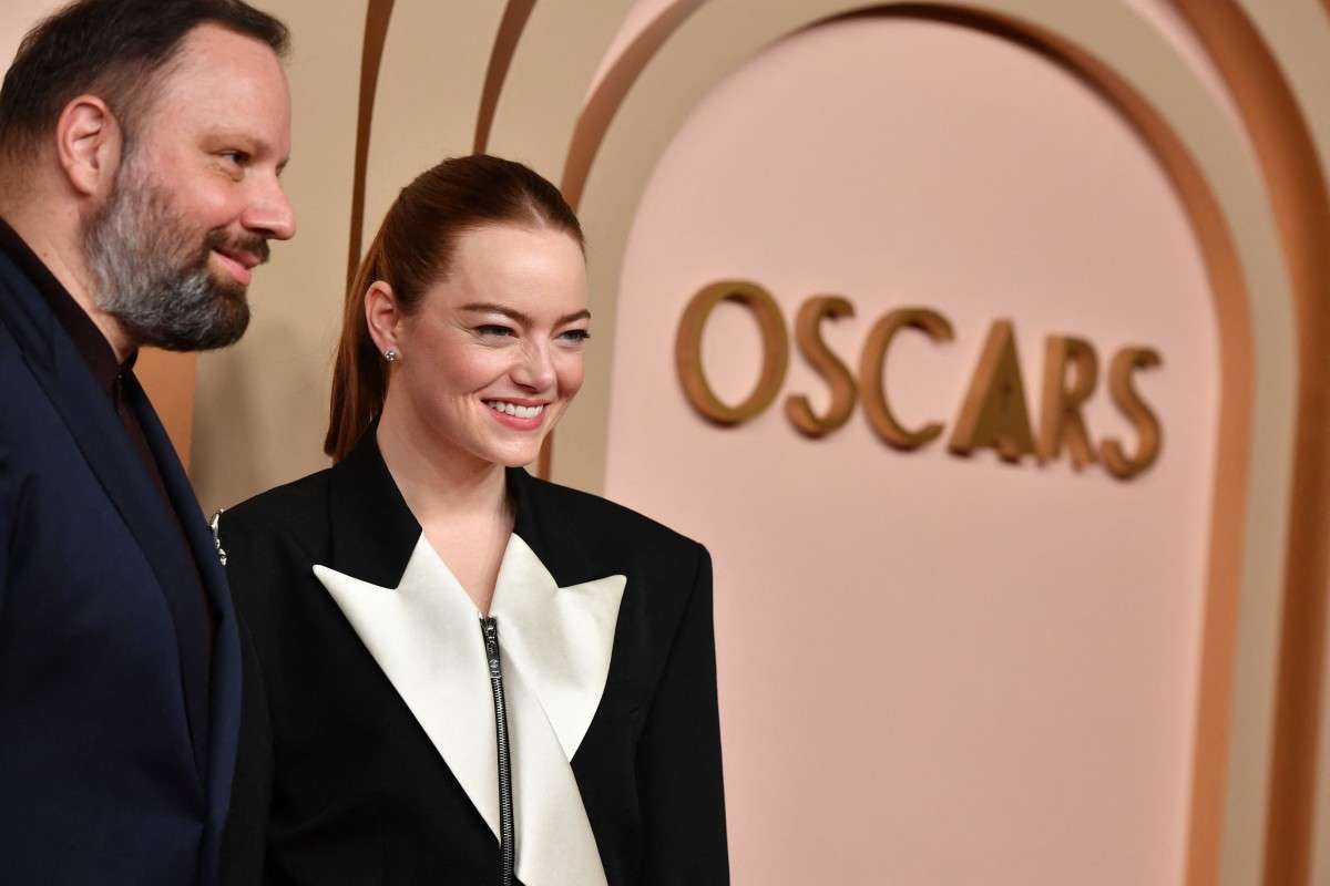  (FILES) US actress Emma Stone (R) and Greek director Yorgos Lanthimos attend the Oscar Nominees Luncheon at the Beverly Hilton in Beverly Hills, California, on February 12, 2024. From dramas about the atomic bomb and Auschwitz, to comedies about dolls and sex-mad reanimated corpses, this Sundays Oscars best picture lineup is the most varied in years. Here are the ten movies from 2023 that will go head-to-head for Hollywoods most prestigious prize: American Fiction, Anatomy of a Fall, Barbie, The Holdovers, Killers of the Flower Moon, Maestro, Oppenheimer, Past Lives, Poor Things, The Zone of Interest. (Photo by Valerie MACON / AFP)       