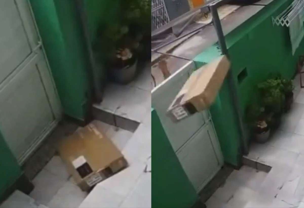 Entregador arremessa caixa com TV por cima de portão e danifica aparelho; vídeo