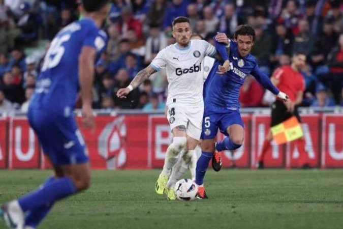 David Soria, goleiro do Getafe, faz grande defesa e ajuda sua equipe a vencer o Girona - (crédito: AFP via Getty Images) David Soria, goleiro do Getafe, faz grande defesa e ajuda sua equipe a vencer o Girona - (crédito: AFP via Getty Images)