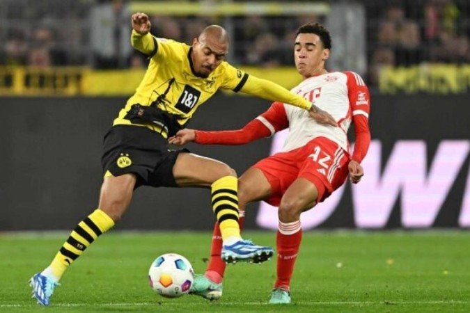 Bayern de Munique e Borussia Dortmund fazem o maior clássico da Alemanha - (crédito: AFP via Getty Images) Bayern de Munique e Borussia Dortmund fazem o maior clássico da Alemanha - (crédito: AFP via Getty Images)