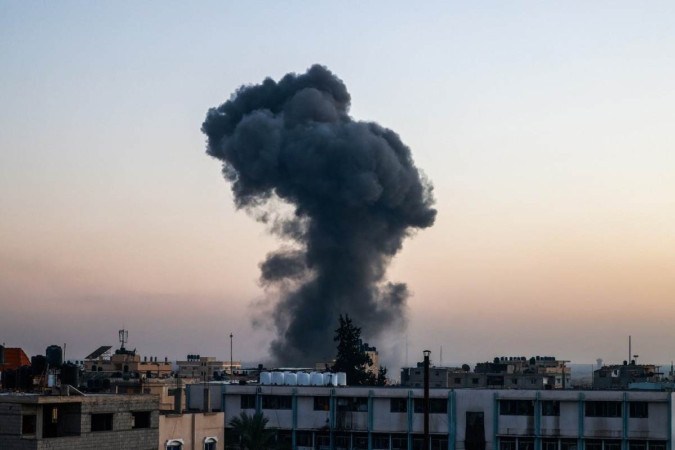 A ofensiva aérea e terrestre lançada por Israel em retaliação já deixou mais de 33 mil mortos, na maioria civis -  (crédito: Mohammed ABED / AFP)