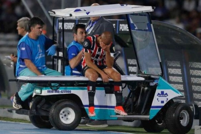 Lucas Moura sofreu uma lesão muscular na parte posterior da coxa esquerda - Foto: Diego Lima / AFP -  (crédito: Foto: Diego Lima / AFP)