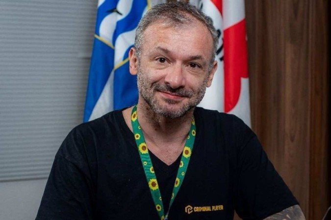 Juiz Alexandre usa cordão do autismo no tribunal: ocupar os espaços - (crédito: Arquivo Pessoal) Juiz Alexandre usa cordão do autismo no tribunal: ocupar os espaços - (crédito: Arquivo Pessoal)
