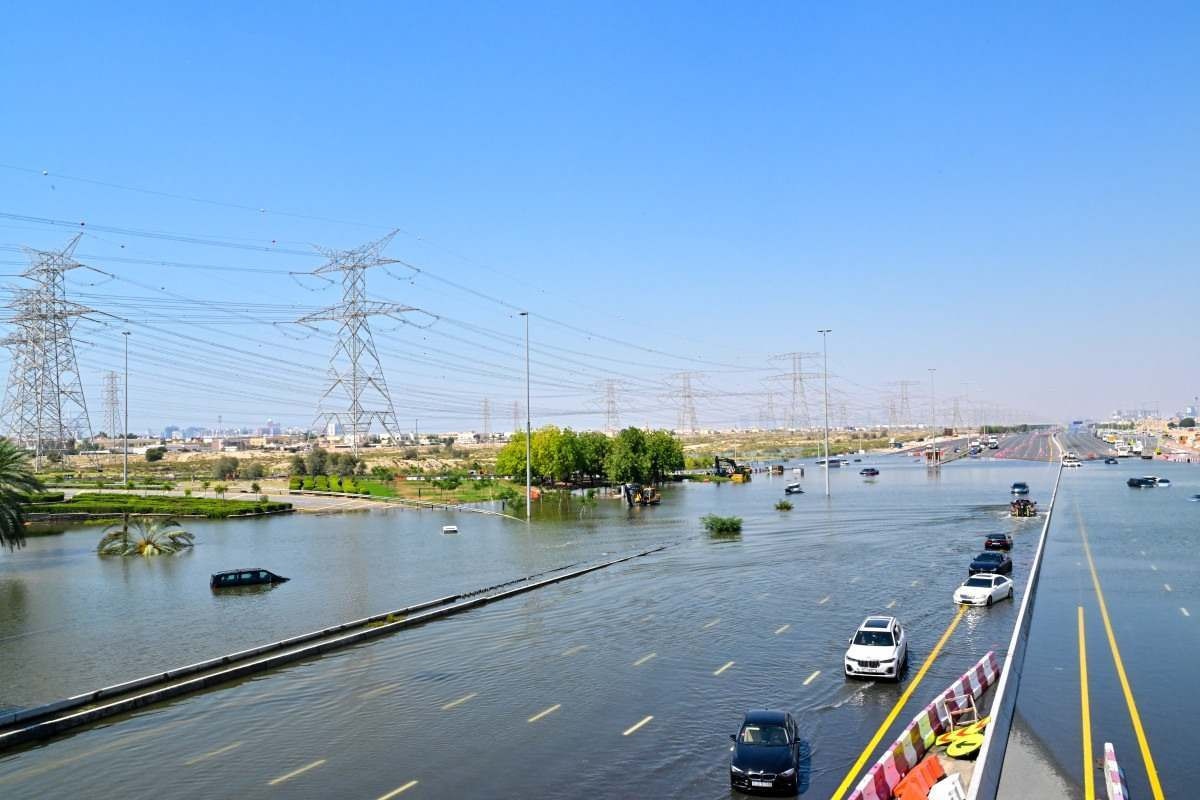  Cars are stranded on a flooded al-Khalil road in the al-Barsha area in Dubai following heavy rains on April 18, 2024. Dubais giant highways were clogged by flooding and its major airport was in chaos as the Middle East financial centre remained gridlocked on April 18, a day after the heaviest rains on record. (Photo by Giuseppe CACACE / AFP)       