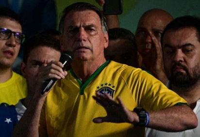 Jair Bolsonaro convidou seus apoiadores a manifestação do dia 21 de abril em Copacabana, no Rio de Janeiro -  (crédito: Pablo PORCIUNCULA / AFP)