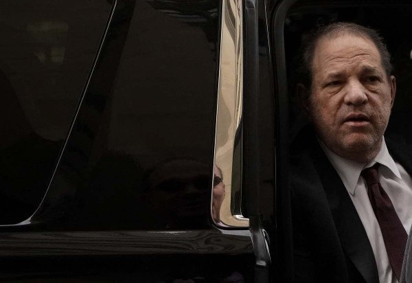  (FILES) Harvey Weinstein arrives at Manhattan Supreme Court February 20, 2020, for the third day of jury deliberations in his sex assault trial in New York. New York's highest court on April 25, 2024, overturned Hollywood producer Weinstein's 2020 conviction on sex crime charges and ordered a new trial. In their decision, judges cited errors in the way the trial had been conducted, including admitting the testimony of women who were not part of the charges against him. 'Order reversed and a new trial ordered,' the judges wrote. (Photo by TIMOTHY A. CLARY / AFP)
      