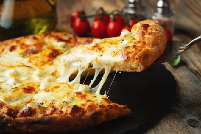 É preciso ter cautela ao consumir a pizza no dia seguinte (Imagem: VasiliyBudarin | Shutterstock) -  (crédito: EdiCase - Culinaria -> Diversão e Arte)