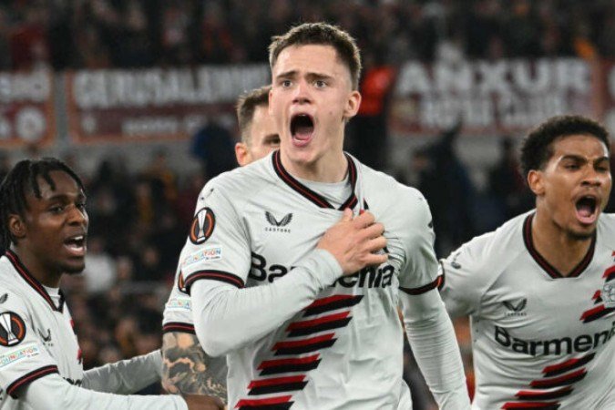 Florian Wirtz celebra o gol que abriu o caminho para a vitória do Leverkusen contra a Roma - Foto: Alberto Pizzoli/AFP via Getty Images - (crédito: Alberto Pizzoli/AFP via Getty Images) Florian Wirtz celebra o gol que abriu o caminho para a vitória do Leverkusen contra a Roma - Foto: Alberto Pizzoli/AFP via Getty Images - (crédito: Alberto Pizzoli/AFP via Getty Images)