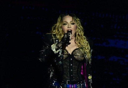  US pop star Madonna performs onstage during a free concert at Copacabana beach in Rio de Janeiro, Brazil, on May 4, 2024. . Madonna ended her ?The Celebration Tour? with a performance attended by some 1.5 million enthusiastic fans. (Photo by Pablo PORCIUNCULA / AFP)
       -  (crédito: Pablo PORCIUNCULA/AFP)