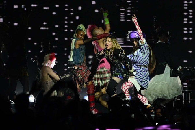  US pop star Madonna performs onstage during a free concert at Copacabana beach in Rio de Janeiro, Brazil, on May 4, 2024. . Madonna ended her ?The Celebration Tour? with a performance attended by some 1.5 million enthusiastic fans. (Photo by Pablo PORCIUNCULA / AFP)
      