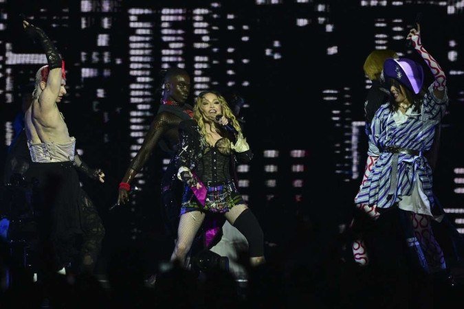  US pop star Madonna performs onstage during a free concert at Copacabana beach in Rio de Janeiro, Brazil, on May 4, 2024. . Madonna ended her ?The Celebration Tour? with a performance attended by some 1.5 million enthusiastic fans. (Photo by Pablo PORCIUNCULA / AFP)
      