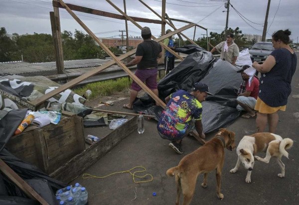 Ao todo 417 cidades foram afetadas pelas chuvas no RS, deixando 163 mil gaúchos desalojados e outros 66 mil em abrigos -  (crédito: Nelson ALMEIDA / AFP)