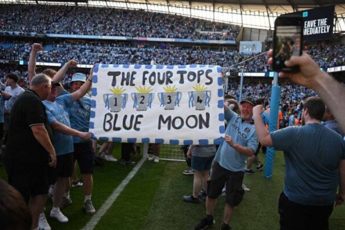 Manchester City celebra quarto título consecutivo na Premier League -  (crédito: Foto: OLI SCARFF/AFP via Getty Images)