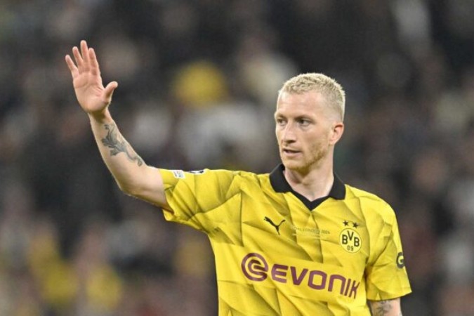  Dortmund's German forward #11 Marco Reus waves during the UEFA Champions League final football match between Borussia Dortmund and Real Madrid, at Wembley stadium, in London, on June 1, 2024. (Photo by INA FASSBENDER / AFP) (Photo by INA FASSBENDER/AFP via Getty Images)
     -  (crédito:  AFP via Getty Images)