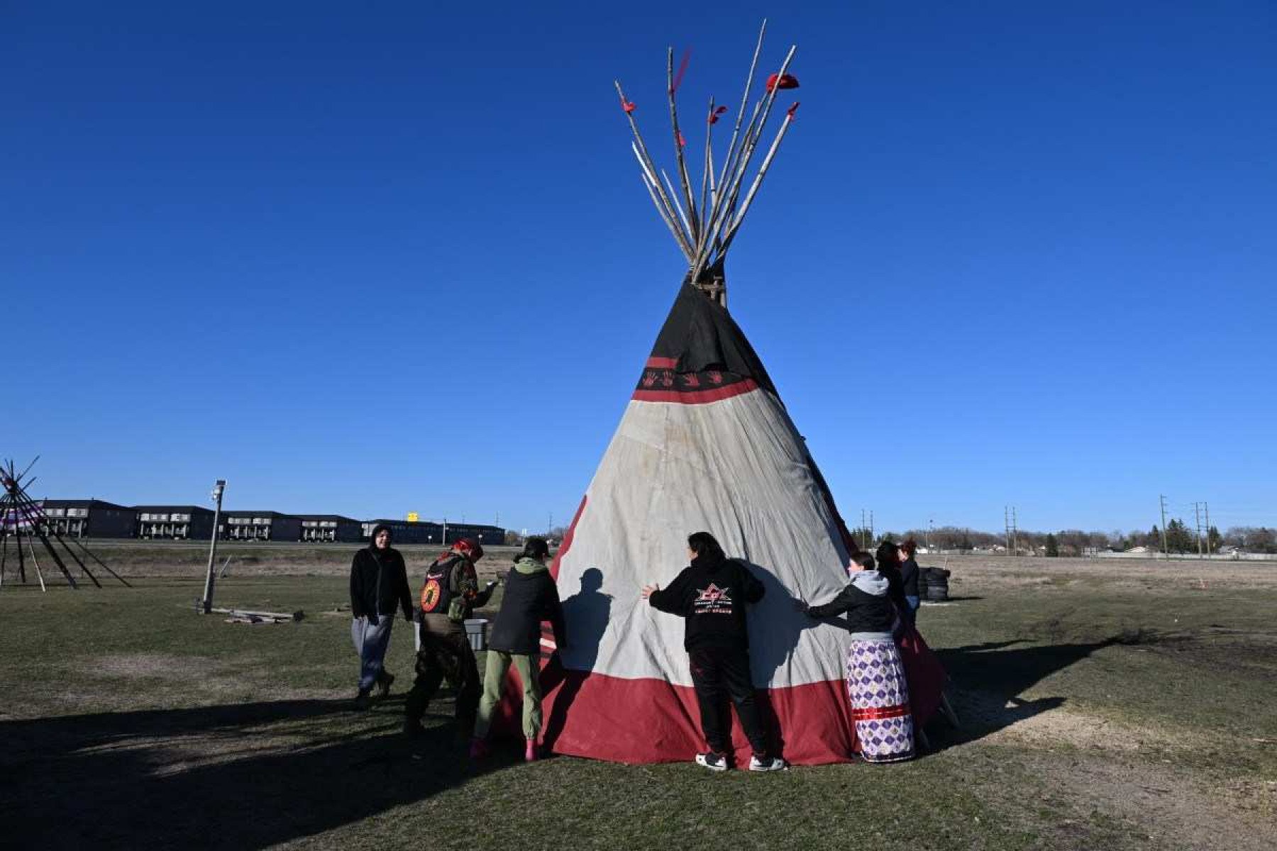  Harris family and friends prepare to set a ceremonial tepee in honor of slain Morgan Harris and other Missing and Murdered Indigenous Women, at 