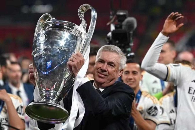 Carlo Ancelotti é o recordista de títulos da Liga dos Campeões, com duas pelo Milan e três pelo Real Madrid -  (crédito: Glyn Kirk/AFP)