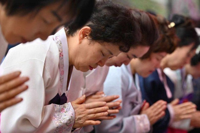 Países do Leste Asiático apresentam uma das taxas mais elevadas de pessoas que abandonam e que trocam de religião, segundo pesquisa (na foto, Seul) -  (crédito: Getty Images)