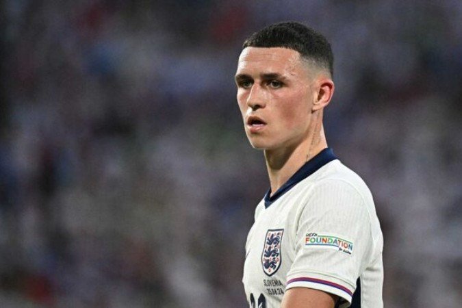  England's midfielder #11 Phil Foden looks on during the UEFA Euro 2024 Group C football match between England and Slovenia at the Cologne Stadium in Cologne on June 25, 2024. (Photo by JAVIER SORIANO / AFP) (Photo by JAVIER SORIANO/AFP via Getty Images)
     -  (crédito:  AFP via Getty Images)