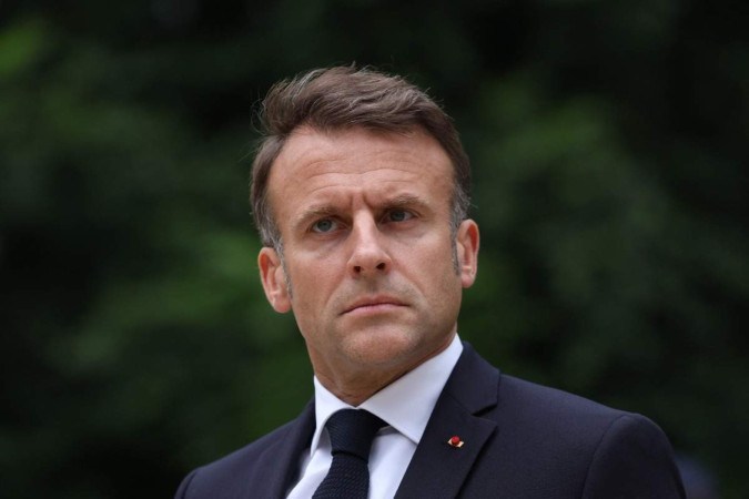 A aliança de centro-direita de Macron conta com 164 cadeiras, e o RN tem 143 -  (crédito: Aurelien Morissard/AFP)