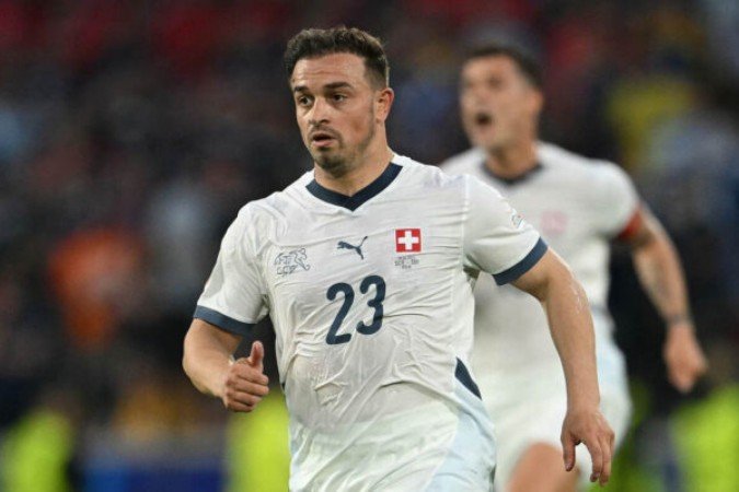  Switzerland's midfielder #23 Xherdan Shaqiri looks on during the UEFA Euro 2024 Group A football match between Scotland and Switzerland at the Cologne Stadium in Cologne on June 19, 2024. (Photo by OZAN KOSE / AFP)
     -  (crédito:  AFP via Getty Images)