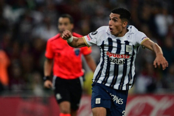  Alianza Lima's Colombian midfielder Kevin Serna celebrates after scoring his team's second goal during the Copa Libertadores group stage second leg football match between Brazil's Fluminense and Peru's Alianza Lima at the Maracana Stadium in Rio de Janeiro, Brazil, on May 29, 2024. (Photo by Pablo PORCIUNCULA / AFP)
     -  (crédito:  AFP via Getty Images)