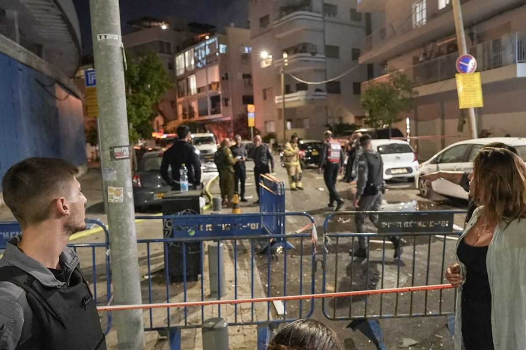  Members of the Israeli security forces are seen at a cordoned-off area where an explosion took place in Tel Aviv on July 19, 2024. The explosion on July 19 was 