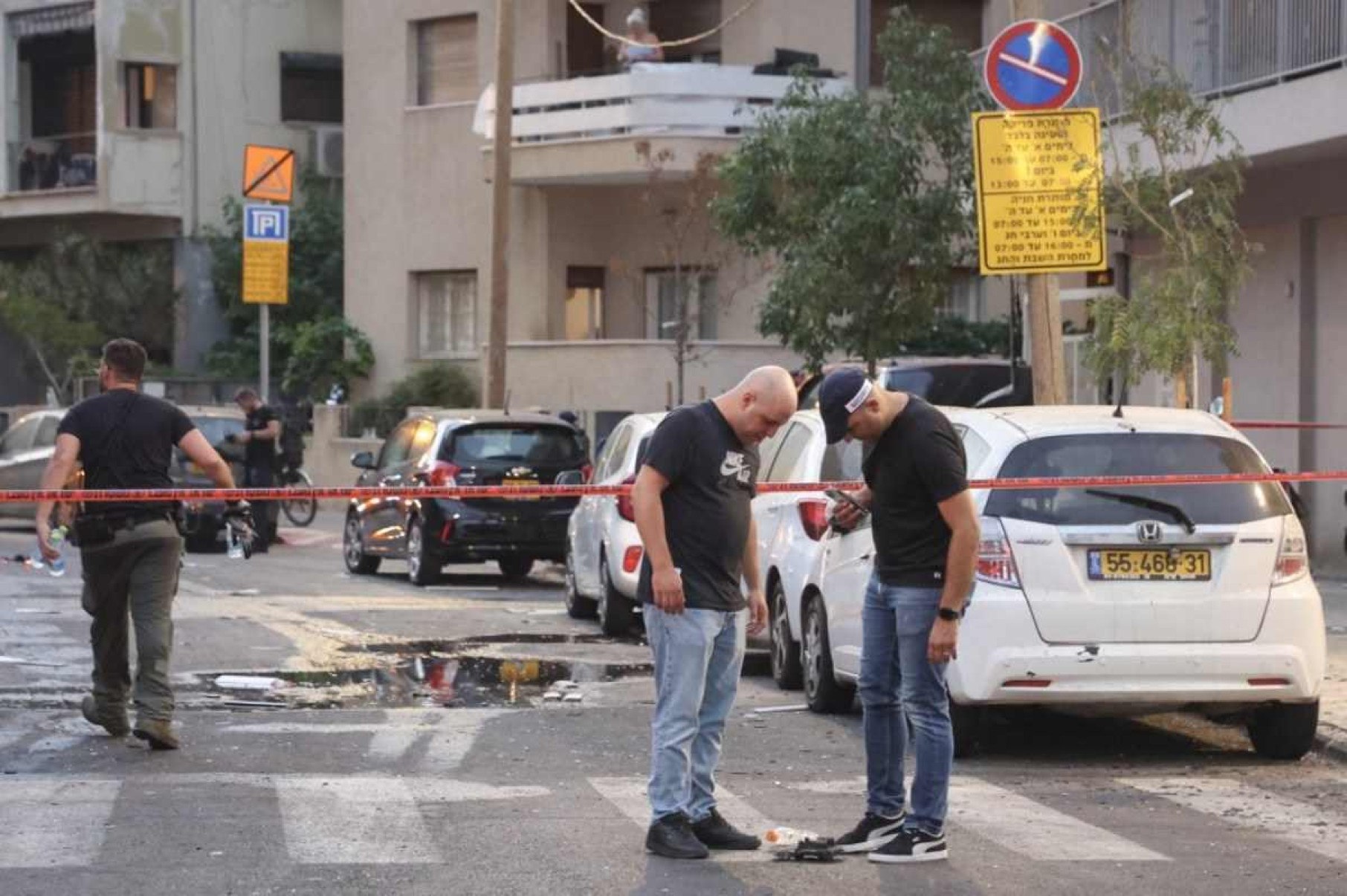  Members of the Israeli security forces are seen at a cordoned-off area where an explosion took place in Tel Aviv on July 19, 2024. The explosion on July 19 was 