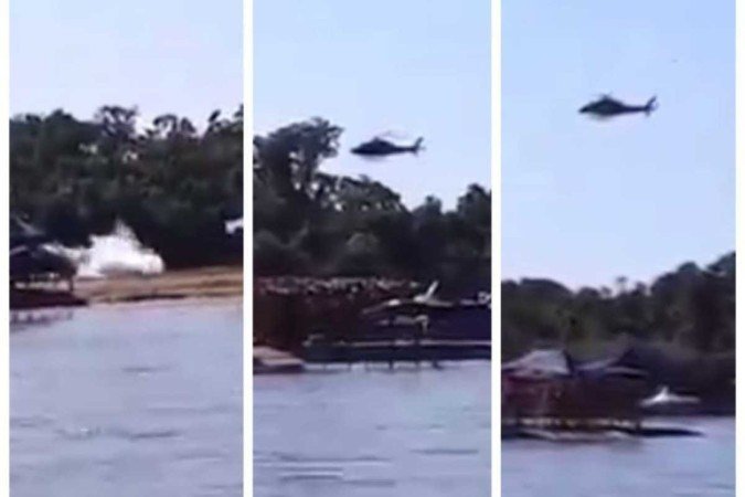 Helicóptero dos Bombeiros fez pouso forçado no Araguaia neste sábado (20/7) - (crédito: Reprodução/Vídeo/X) Helicóptero dos Bombeiros fez pouso forçado no Araguaia neste sábado (20/7) - (crédito: Reprodução/Vídeo/X)