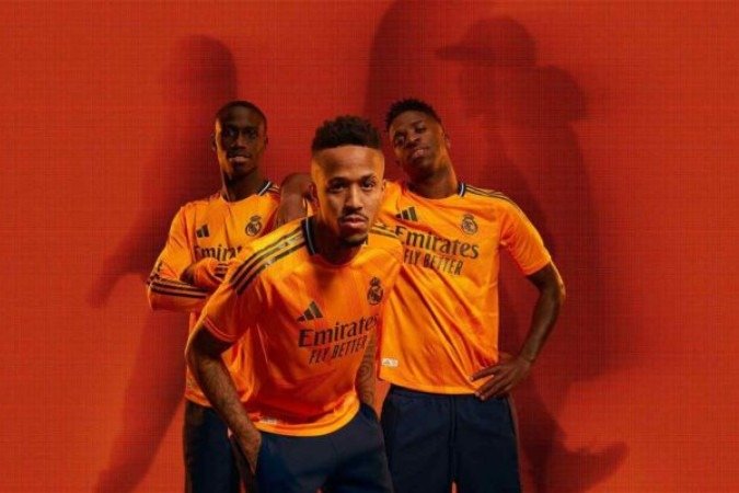  camisa do clube é toda em tom laranja, com detalhes que remetem a 'estrelas que brilham no céu do Bernabéu' -  (crédito: - Foto: Divulgação/Adidas/Real Madrid)