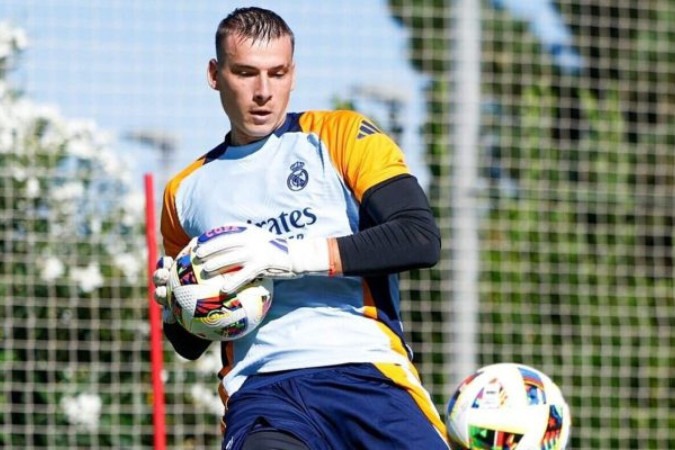 n foi titular em quase toda a fase derradeira da última Liga dos Campeões pelo Real Madrid. Curiosamente, Kepa foi reserva dele no título -  (crédito: Foto: Divulgação / Real Madrid)