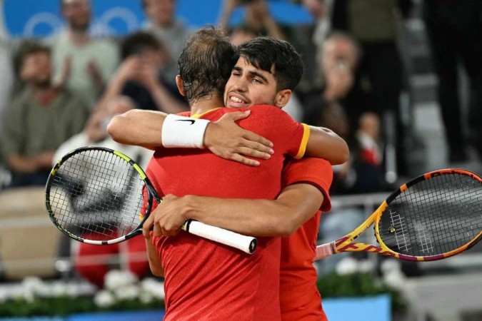 A expectativa em torno da participação dos multicampeõs Nadal e Alcaraz surgiu desde o anúncio da formação da dupla, semanas antes dos Jogos -  (crédito: MARTIN BERNETTI / AFP)