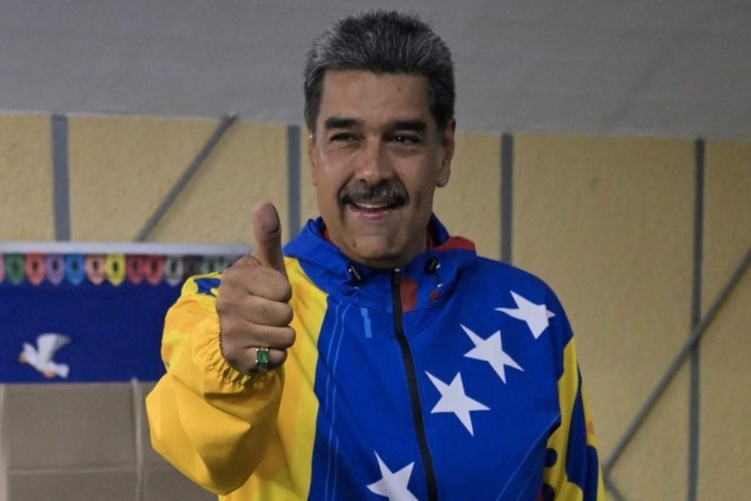 Maduro venceu a eleição, segundo o CNE venezuelano, com 51,2% dos votos, contra 44% de Edmundo González. A oposição, no entanto, contesta resultado -  (crédito: Juan BARRETO / AFP)