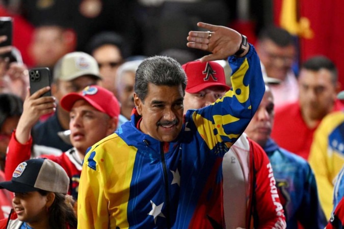 O Conselho Nacional Eleitoral da Venezuela informou que Maduro obteve 51,2% dos votos, contra 44,2% do candidato de oposição, Edmundo González

 -  (crédito: JUAN BARRETO / AFP)