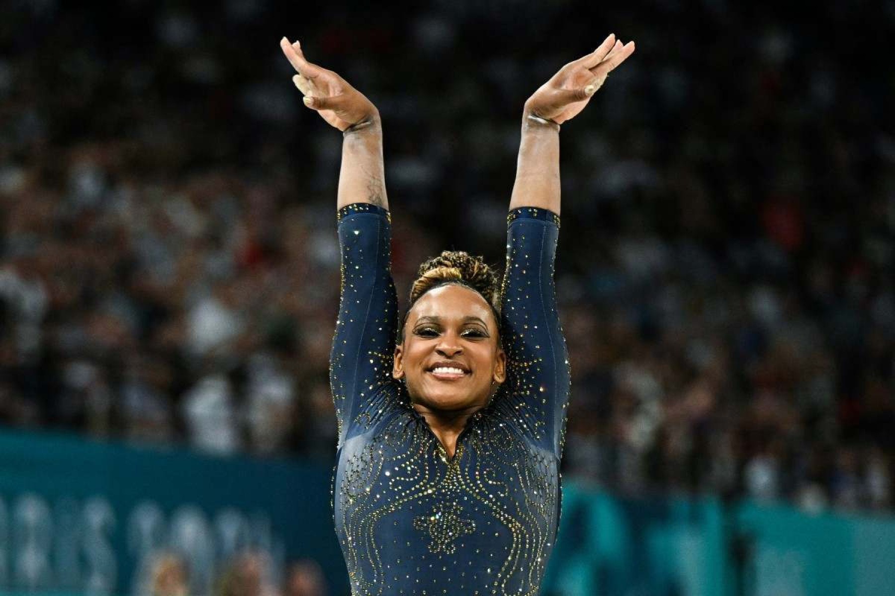  Brazils Rebeca Andrade competes in the balance beam event of the artistic gymnastics womens team final during the Paris 2024 Olympic Games at the Bercy Arena in Paris, on July 30, 2024. (Photo by Gabriel BOUYS / AFP)       