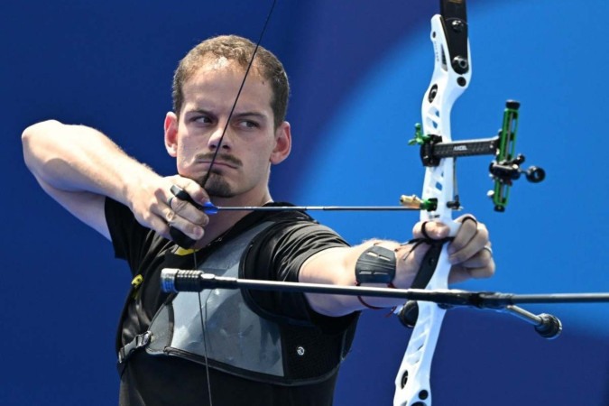 Marcus D'Almeida se classifica para as oitavas de final. -  (crédito: Punit Paranjpe/ AFP)