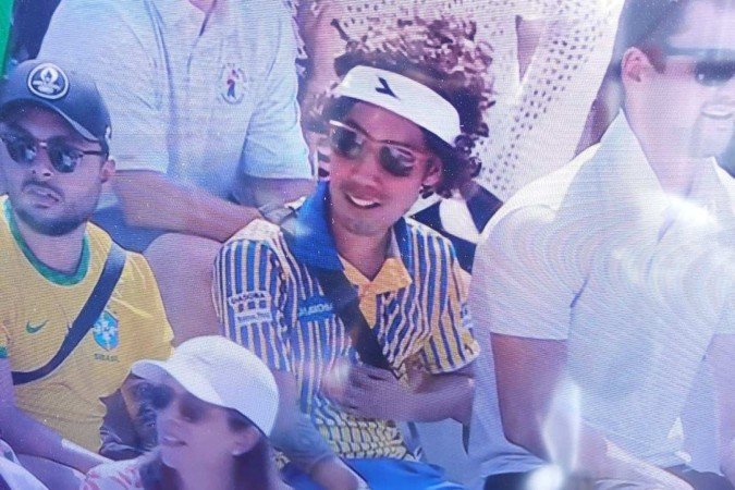 Fã homenageou o campeão Guga em jogo de tênis do Brasil contra os EUA, nesta terça, 30 de julho -  (crédito: Mariana Niederauer/CB/D.A.Press)