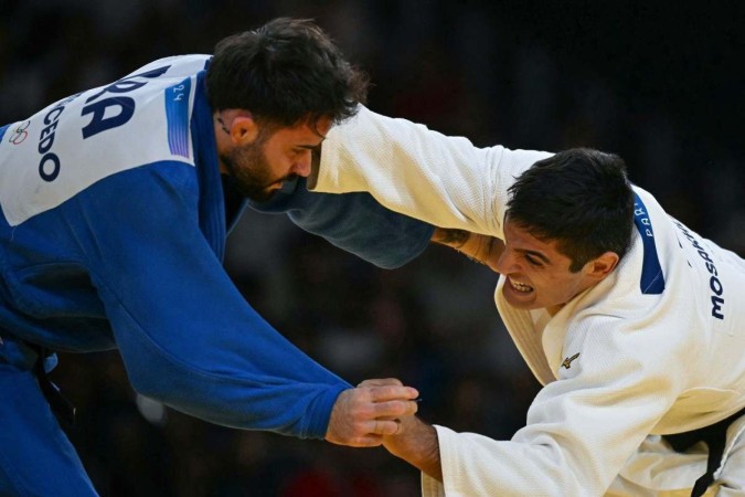 Rafael Macedo perdeu para o espanhol Tristani Mosakhlishvili e irá tentar se salvar na repescagem. -  (crédito: Luis Robayo/ AFP)