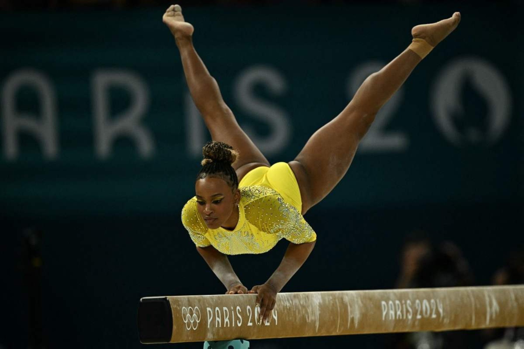  Brazils Rebeca Andrade competes in the balance beam event of the artistic gymnastics womens all around final during the Paris 2024 Olympic Games at the Bercy Arena in Paris, on August 1, 2024. (Photo by Lionel BONAVENTURE / AFP)       