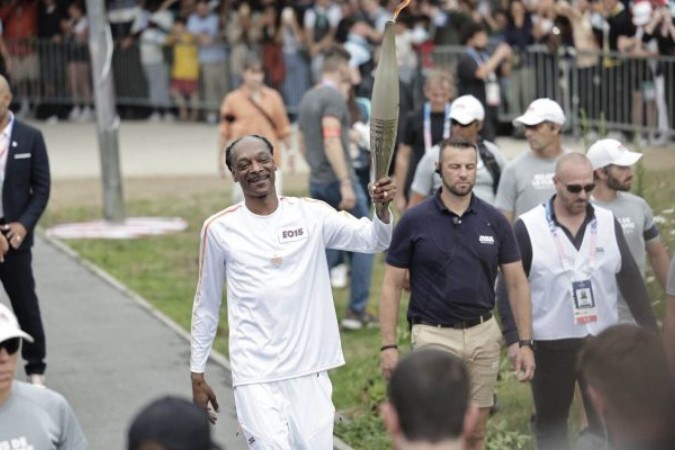 Snoop Dogg recebe salário milionário para comentar as Olimpíadas de Paris 2024 -  (crédito: Foto: STEPHANE DE SAKUTIN/AFP via Getty Images)