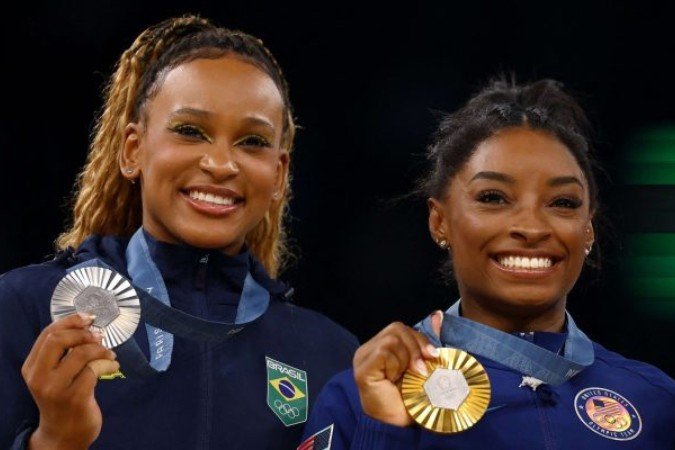 Receba Andrade coloca casa à disposição para receber Simone Biles no carnaval - (crédito: Foto: GABRIEL BOUYS/AFP via Getty Images) Receba Andrade coloca casa à disposição para receber Simone Biles no carnaval - (crédito: Foto: GABRIEL BOUYS/AFP via Getty Images)