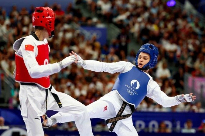 Maria Clara Pacheco (azul) perdeu luta contra a chinesa Luo Zongshi -  (crédito: Abelardo Mendes Jr./Esp. CB/ D.A Press)