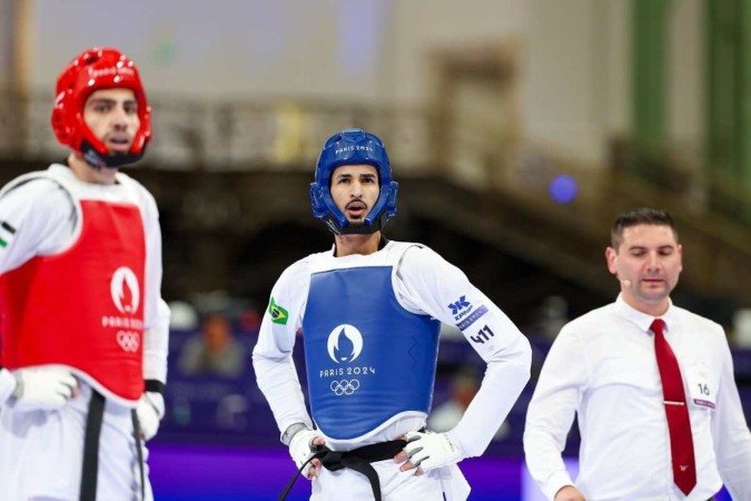 Edival Pontes (de azul) não conseguiu vencer o jordaniano (vermelho) e não avançou às quartas de final - (crédito: Abelardo Mendes Jr/Esp. Correio/D.A.Press) Edival Pontes (de azul) não conseguiu vencer o jordaniano (vermelho) e não avançou às quartas de final - (crédito: Abelardo Mendes Jr/Esp. Correio/D.A.Press)
