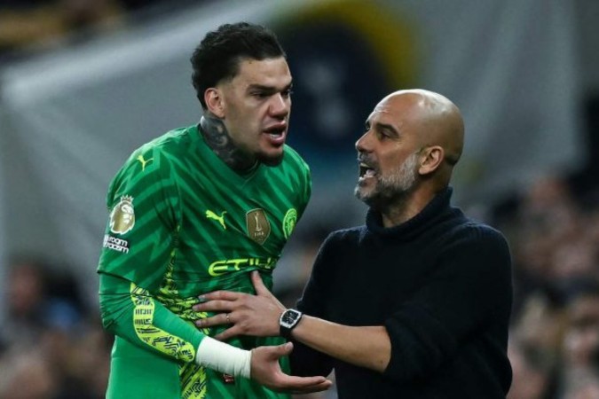 Ederson e Guardiola juntos -  (crédito: Foto:  BEN STANSALL/AFP via Getty Images))