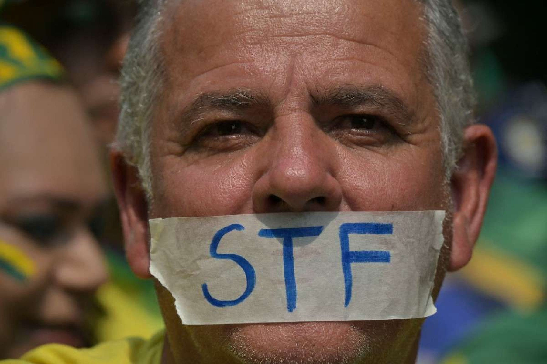     Um apoiador do ex-presidente brasileiro Jair Bolsonaro (2019-2022) participa de um comício do Dia da Independência em São Paulo, Brasil, em 7 de setembro de 2024. (Foto de NELSON ALMEIDA / AFP)       