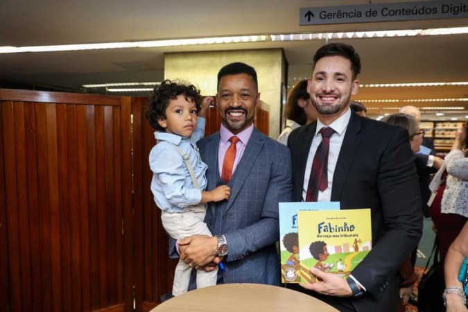 O juiz, seu filho, Gael, e seu companheiro, Nelson Muniz